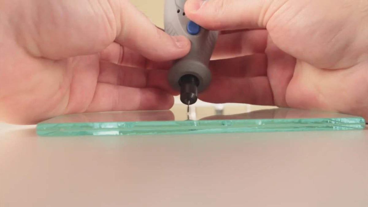 Clearshield bits laid out in a repair shop near a drill conveying professional compatibility