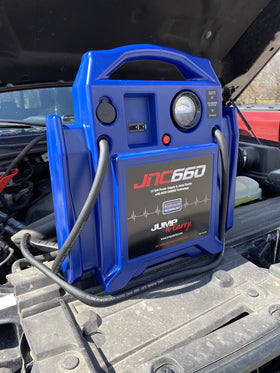 Clore Automotive JNC660 held by hand to show scale and portability for workshop and emergency use