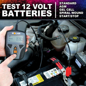 Clore Automotive SOLAR BA9 clamps attached to battery terminals, reliable testing in action