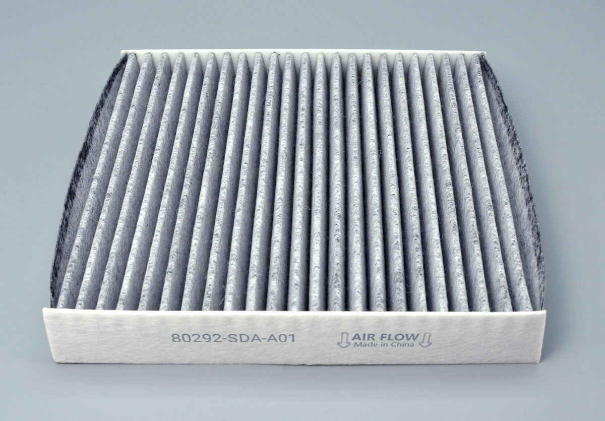 COCOAUTO filter size comparison next to hand shows correct fitment