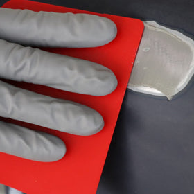 Colad inventing more putty being cured with Colad UV light for rapid hardening