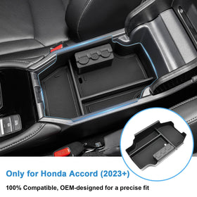 Coleya close-up of the upper tray revealing organized phone and small item storage