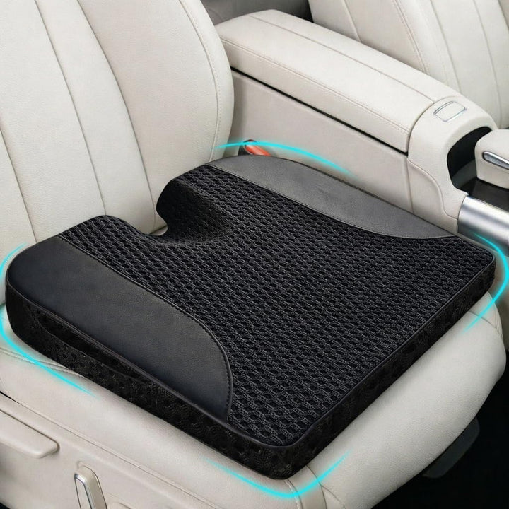 ComfiLumba front view black mesh cushion showing ergonomic shape and improved comfort