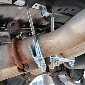 COROTC lifestyle garage shot of user installing hanger for reliability