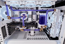 Corsair XL8 coolant being poured into a PC reservoir showing clean fill benefit
