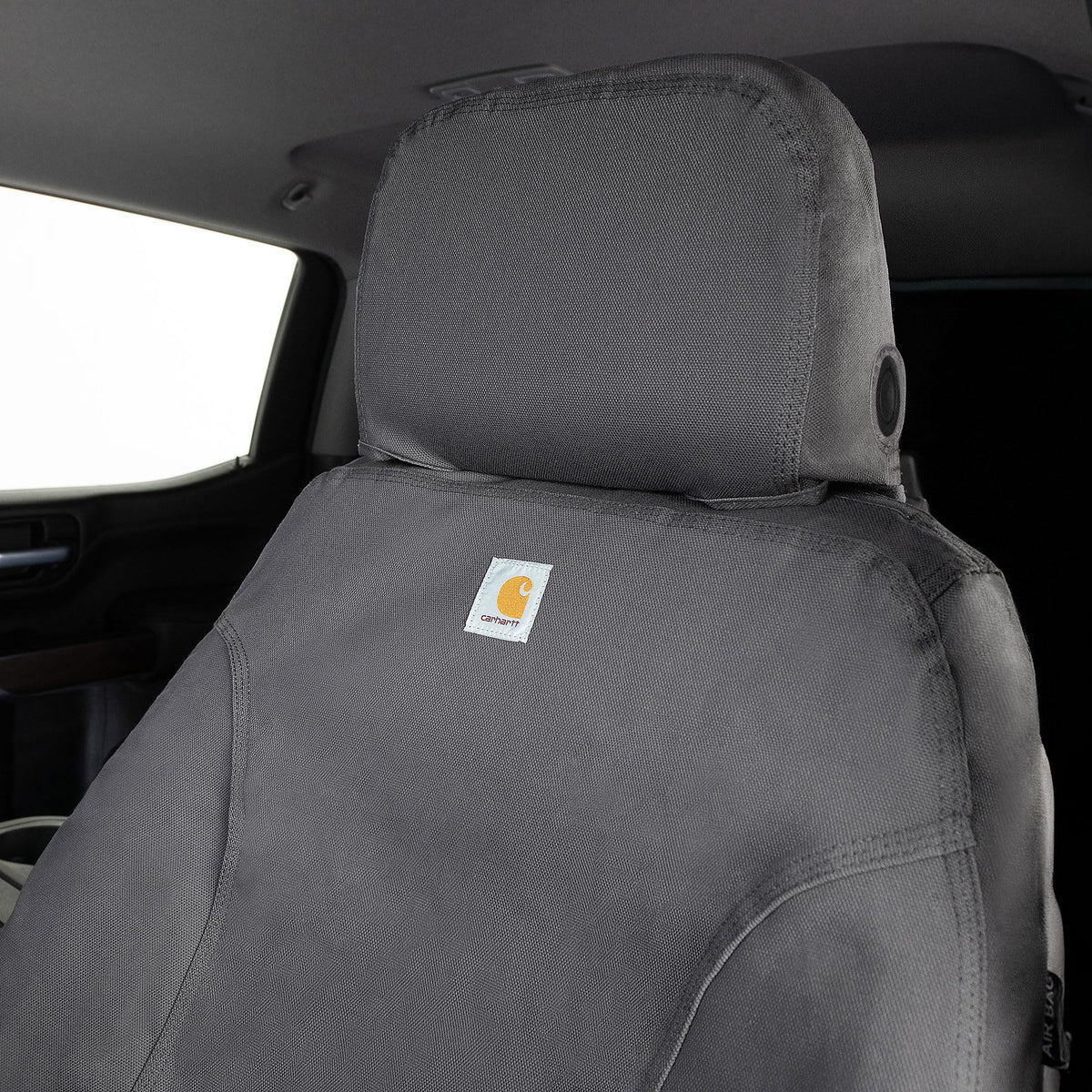 Covercraft Carhartt seat cover installed in Tacoma illustrating protective fit