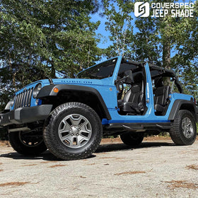 coverspec lifestyle image of Jeep driving on beach with shade installed for UV protection