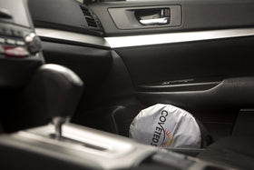 Coveted Shade deployed in minivan windshield lowering cabin heat