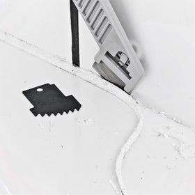 Cramer tool forming silicone on a bathroom tile joint for neat results