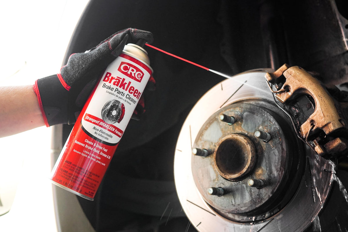 CRC Brakleen spraying onto brake caliper removing grease for faster service