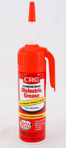CRC dielectric grease bottle held in hand showing compact 3.3 oz size for toolkits