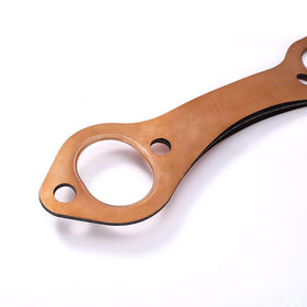 Creative.C gasket aligned with head flange demonstrating bolt pattern match for easy installation