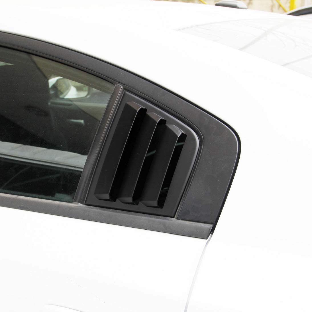 crosselec installed on passenger rear window, improves privacy and style