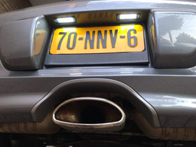 csslyzl illuminated license plate at night demonstrating bright xenon-white visibility