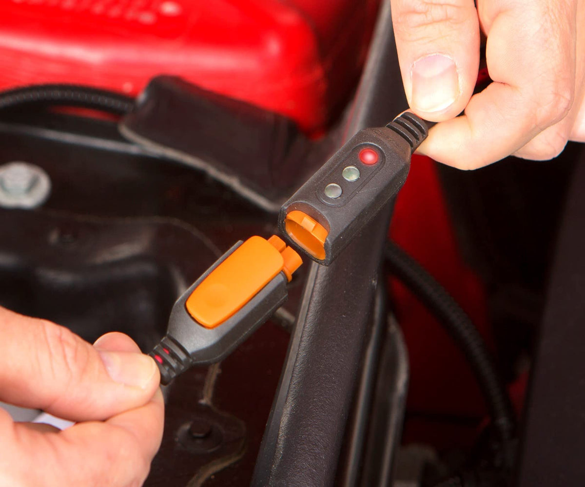 CTEK pigtail connected to SAE lead on battery, preserves factory terminals