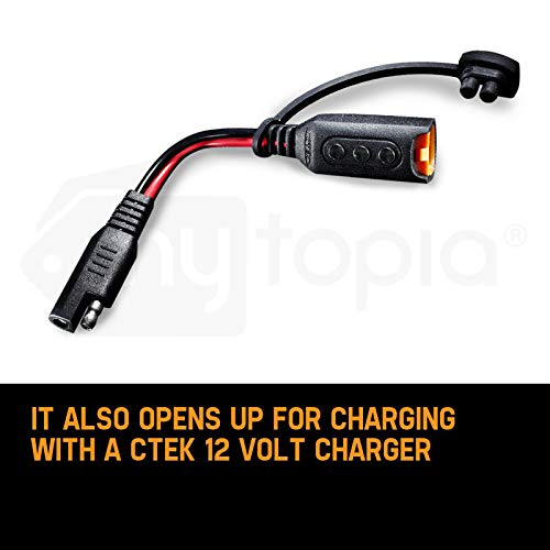 CTEK pigtail in a garage charging setup, convenient for routine vehicle maintenance