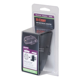 CURT adapter held in hand illustrating compact size and easy storage