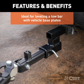 CURT adapter with bike rack attached illustrating level towing benefit