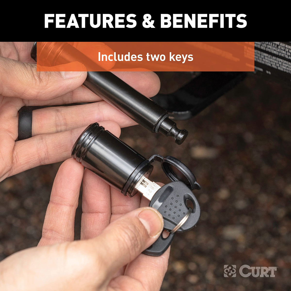 CURT two keys and packaging offering spare-key convenience benefit