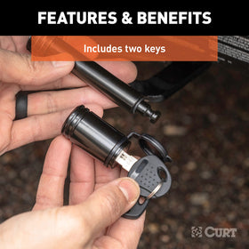 CURT two keys and packaging offering spare-key convenience benefit