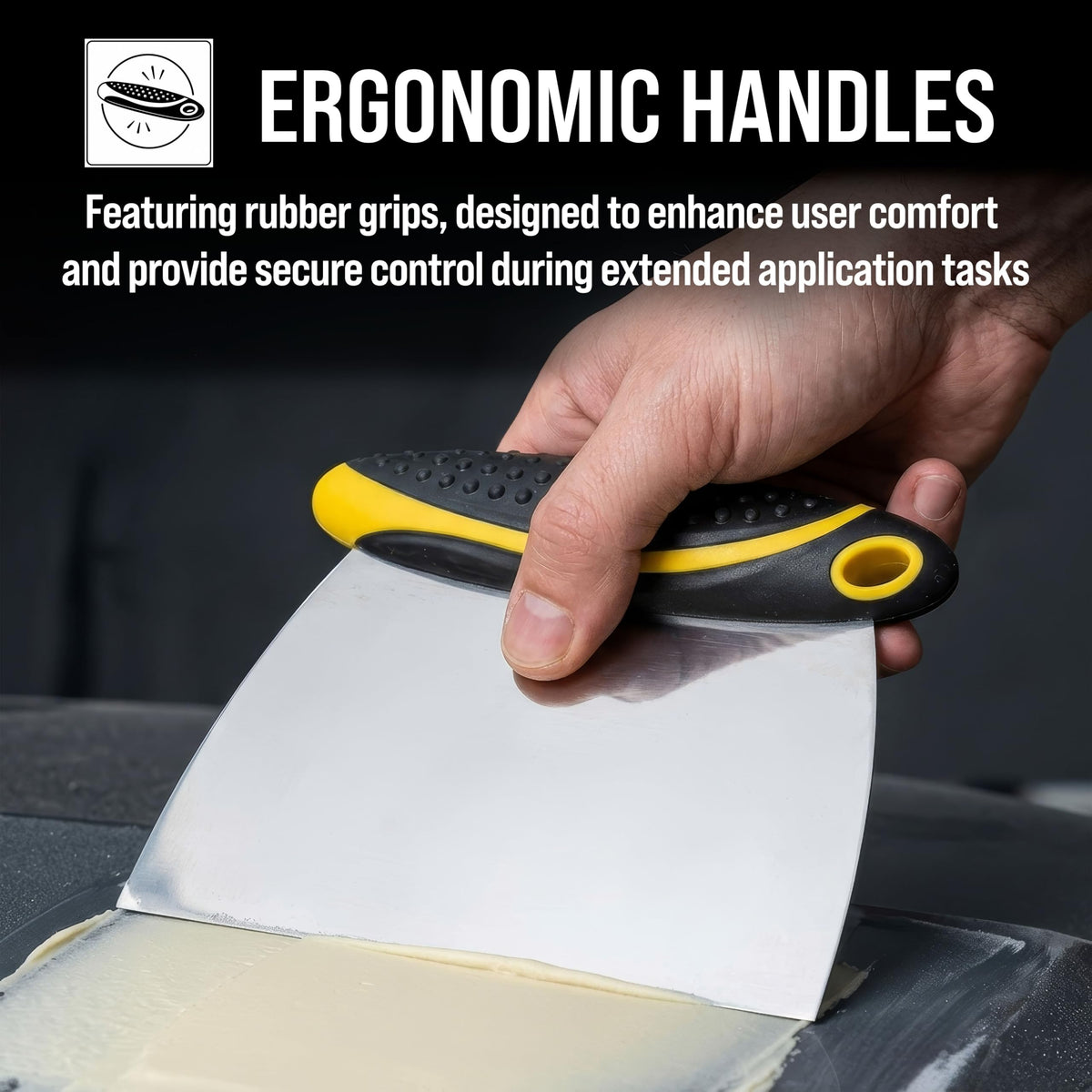 Custom Shop spreader smoothing body filler on car panel for even coverage and minimized sanding