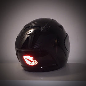 customTAYLOR33 decal on motorcycle helmet showing improved low-light visibility