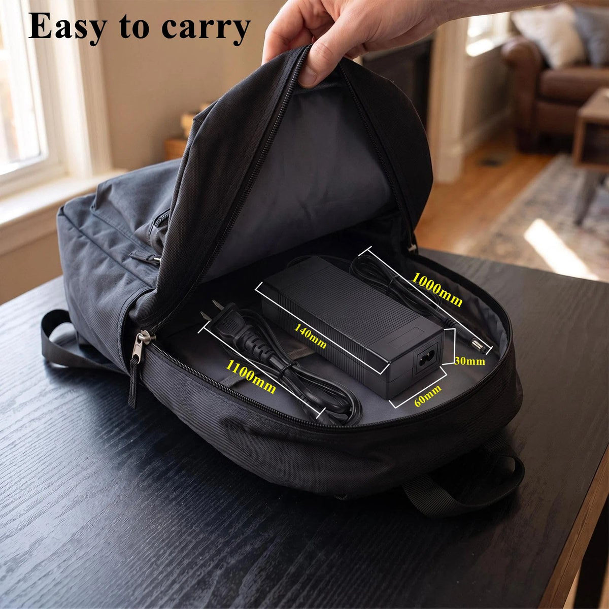 CZJIAWO charger beside scooter battery to show scale and fit for easy replacement