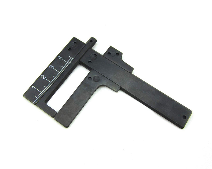 DAMINEDING front view of steel float level gauge showing shape and build quality