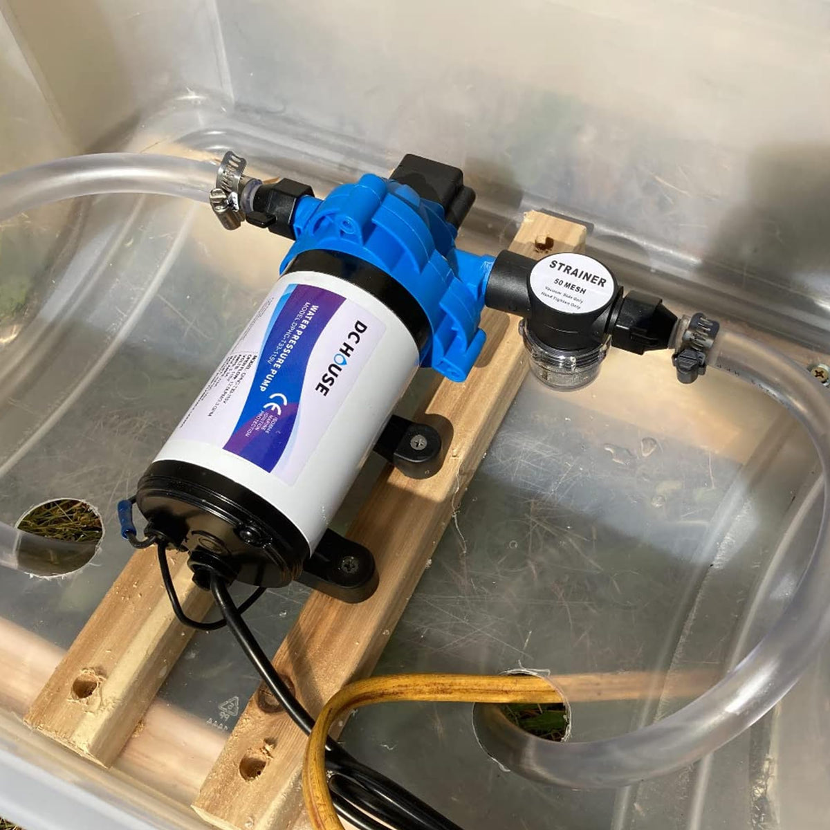 DC HOUSE installed under a food truck sink demonstrating improved water pressure delivery