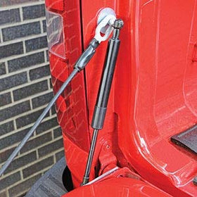 DEE ZEE DZ43102 installed on a Chevy tailgate demonstrating smooth controlled drop and improved safety