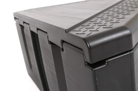 Dee Zee box held to show 36 inch size for easy installation