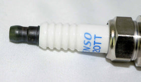 Denso spark plug installed in engine cylinder head demonstrating fitment benefit