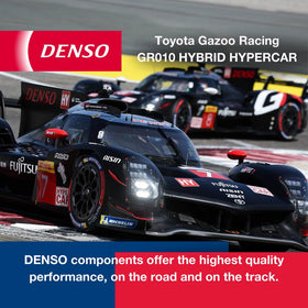 denso IKH16TT next to a coin for size comparison demonstrating compact precision design