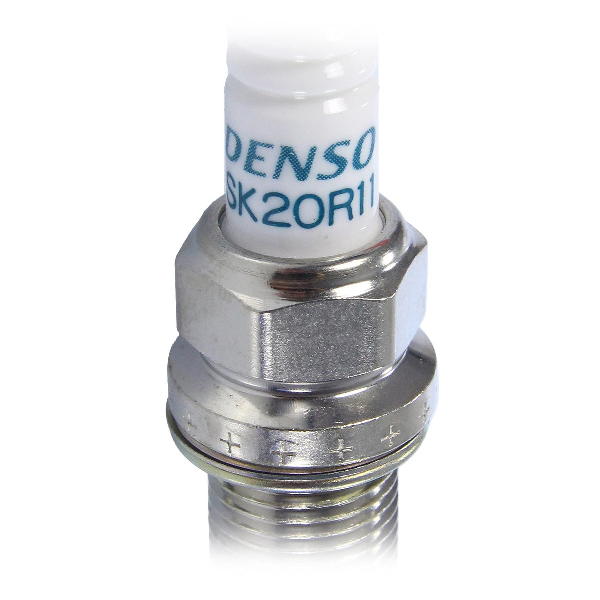 Denso close-up of SK20R11 electrode and ceramic insulator highlighting durable design