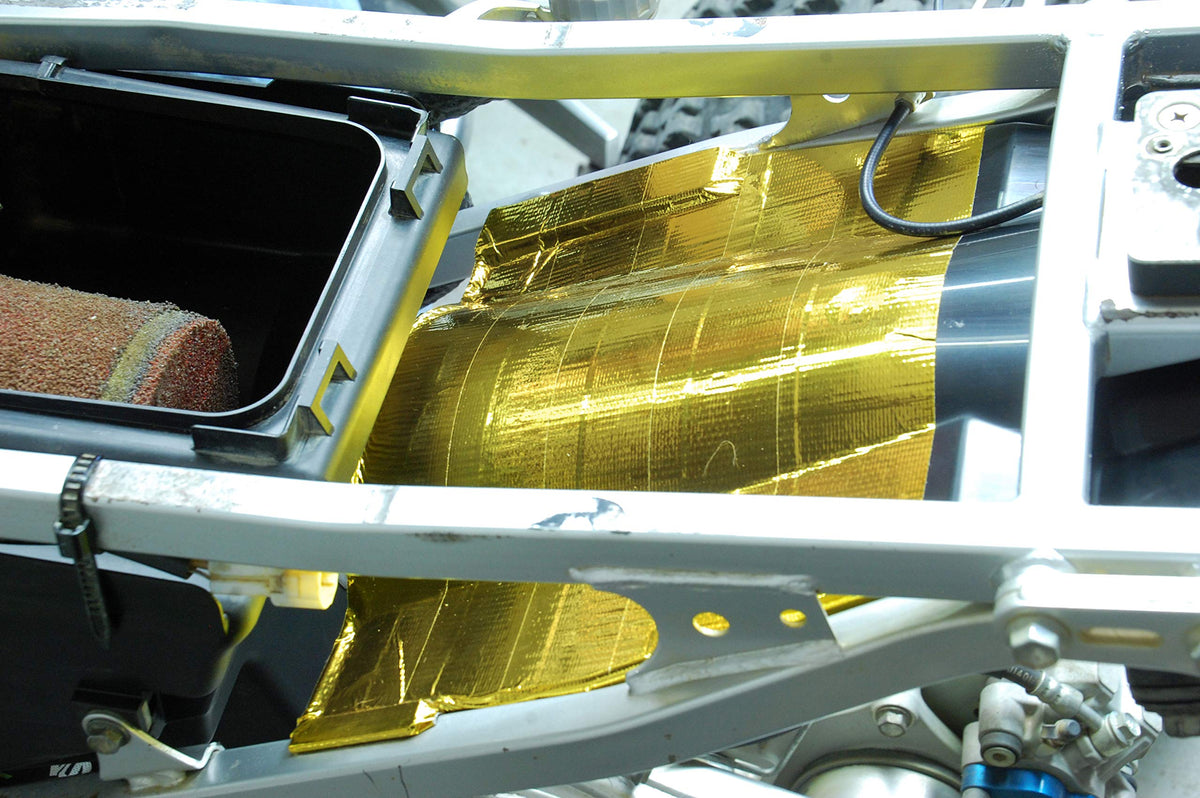Design Engineering adhesive-backed reverse side showing strong bond readiness