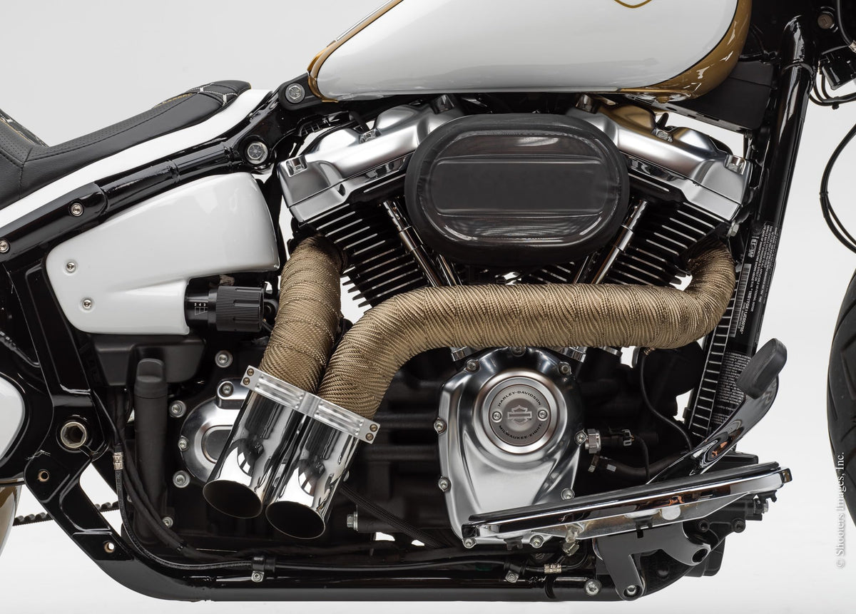 Design Engineering titanium wrap in garage installation scene protecting vehicle components
