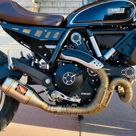 Design Engineering wrapped V8 header demonstrating heat control benefit