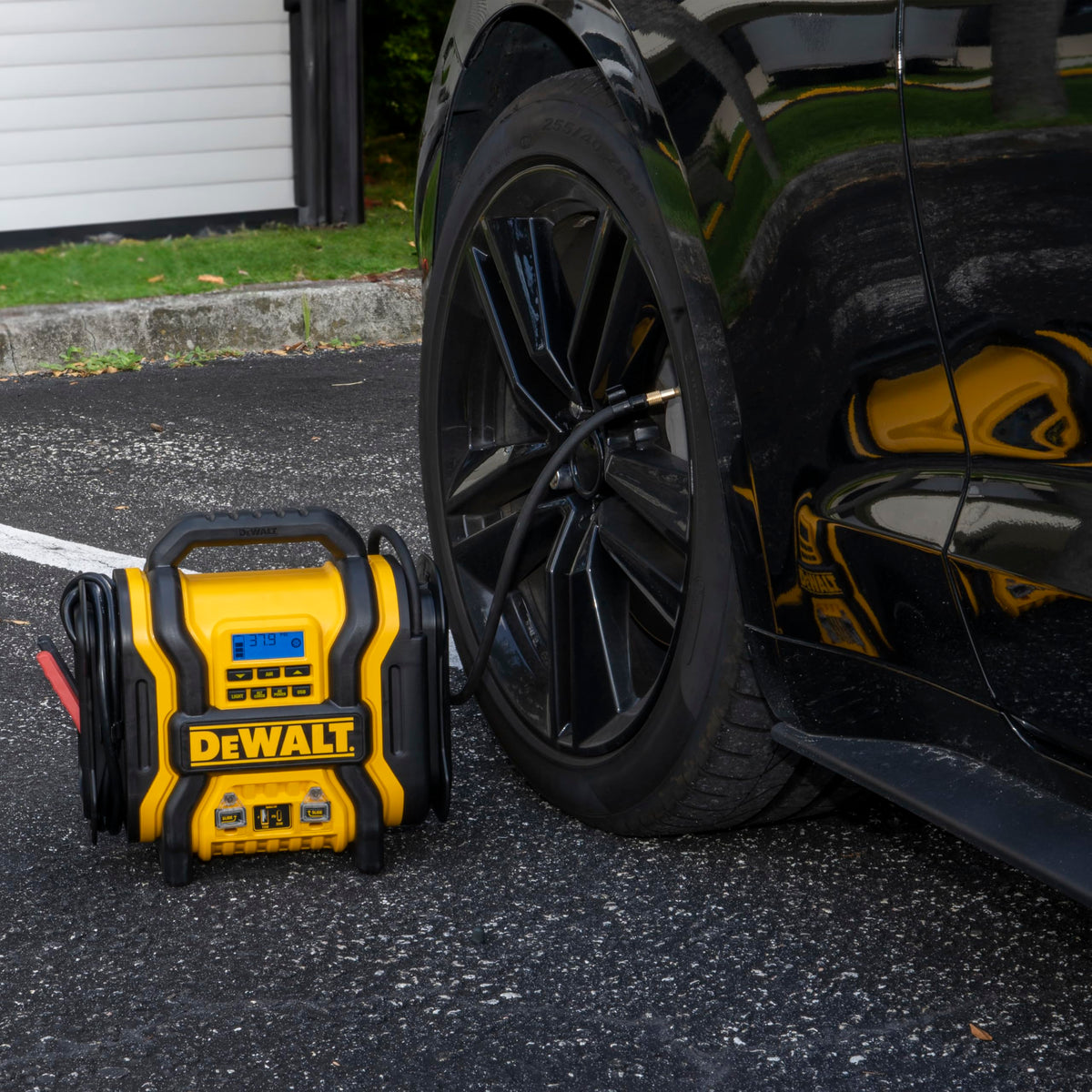 DEWALT digital compressor close-up displaying 120 PSI gauge and auto-stop precision