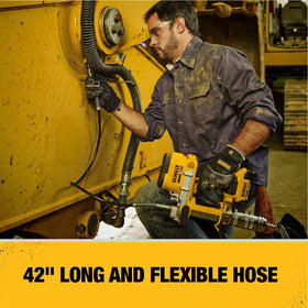 DEWALT grease gun integrated foot resting on flat surface for stable hands-free placement