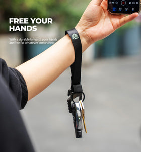 Dexnor next to keys and car fob to show compact size and organization