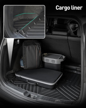 DiffCar mats with wet boots on top, demonstrating easy rinse-clean advantage
