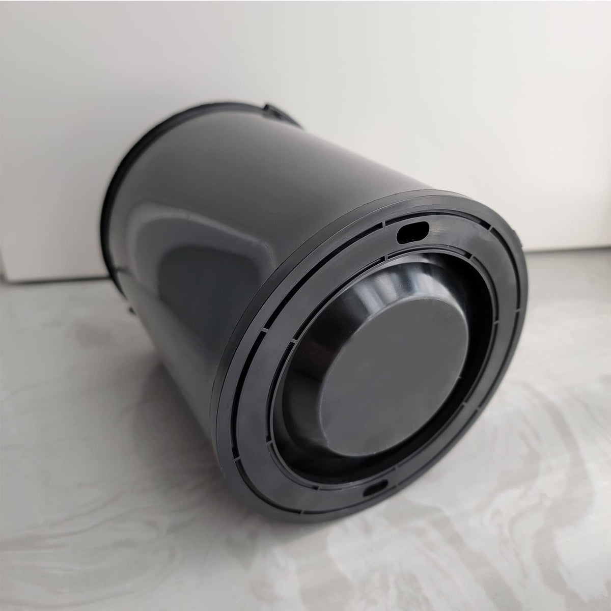 Dimeani canister internal chamber detail illustrating charcoal media reliability