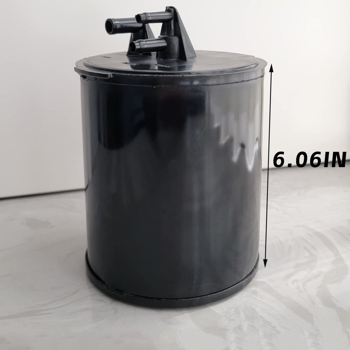 Dimeani canister next to ruler for scale confirming fit and dimensions