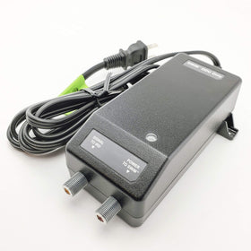 DIRECTV PI-21 next to ruler showing compact size for easy placement and installer convenience
