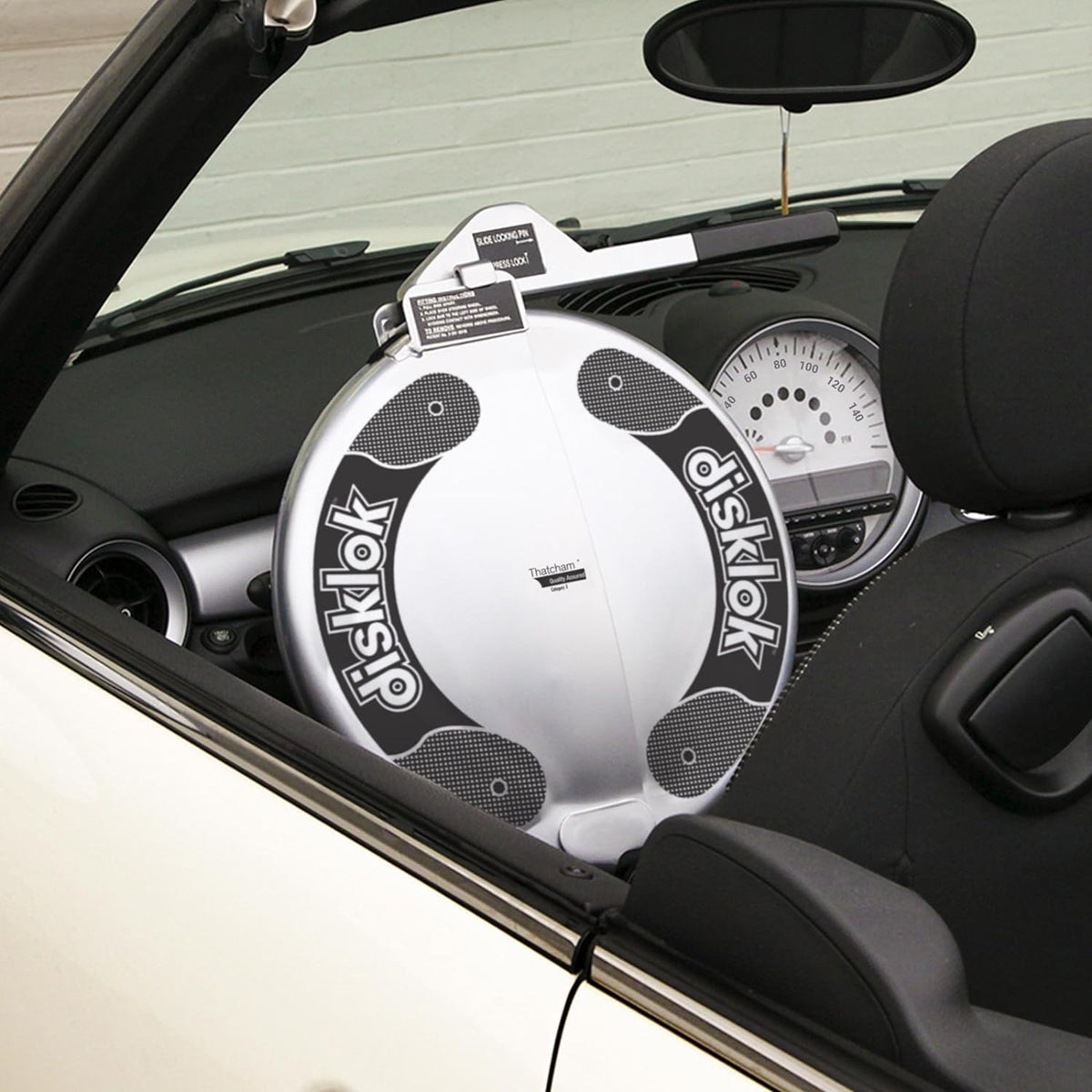 Disklok installed on steering wheel showing brand protection in use