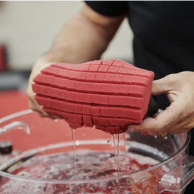 diy detail wet sponge dripping water to show high absorbency and soap retention