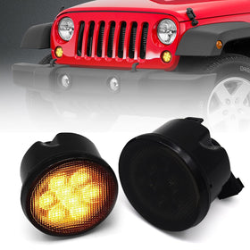 DKMGHT front assembly on Jeep Wrangler showing sleek smoked lens and improved style