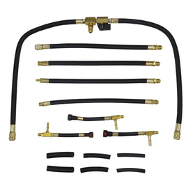 DKwoeshg assortment of adapters laid out to match various vehicle fuel ports