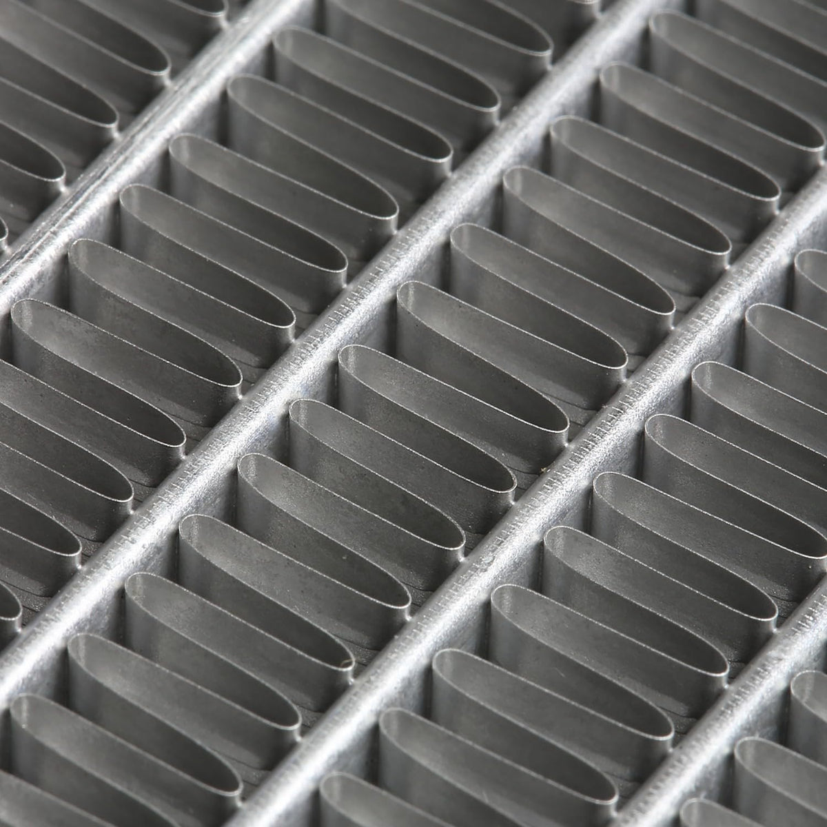 DNA Motoring radiator next to ruler to show core dimensions for accurate fitment