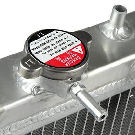 DNA MOTORING inlet and outlet ports showing OEM-sized 1¼-inch hose compatibility